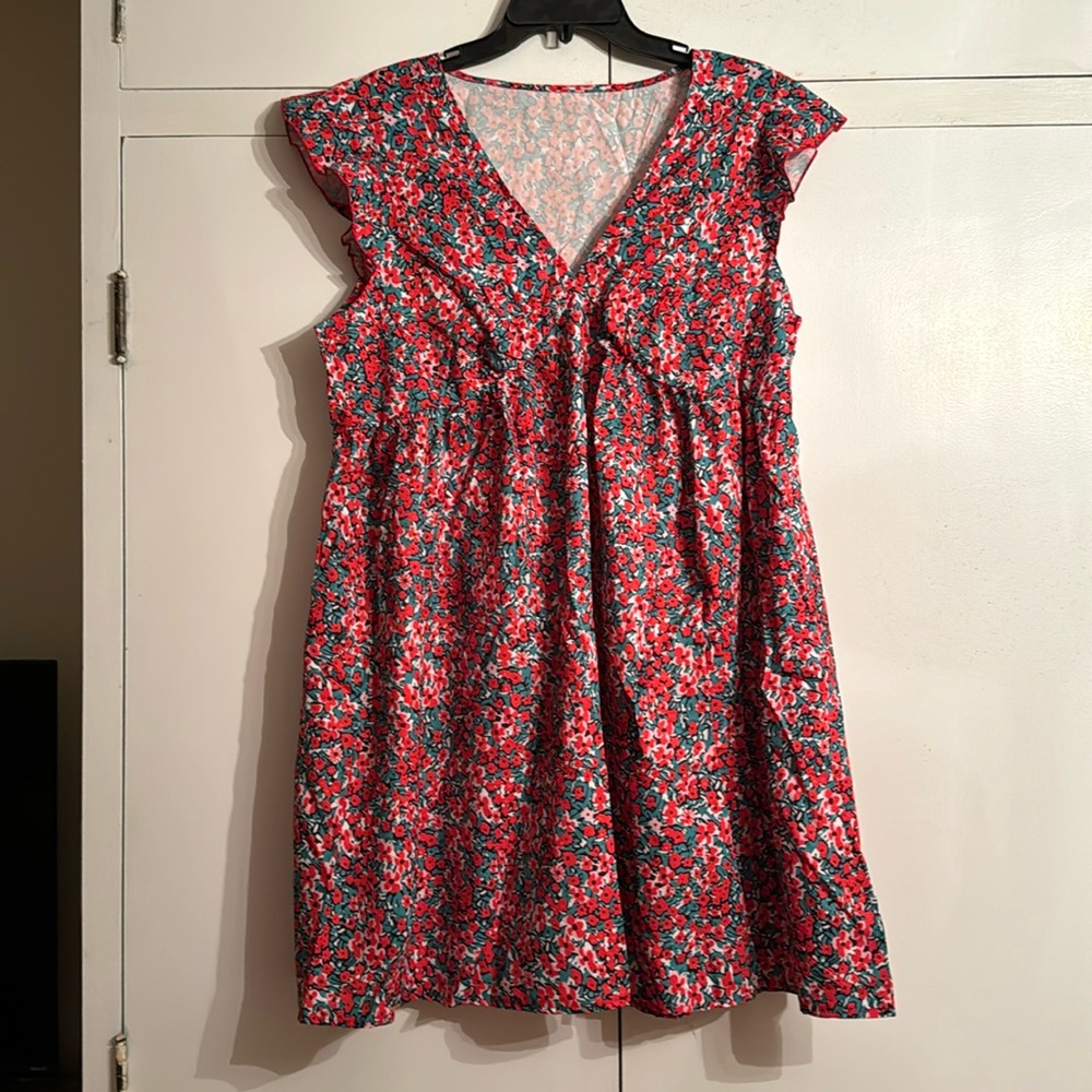 Brand new dress. XL. Floral pattern. All offers are comsidered!
